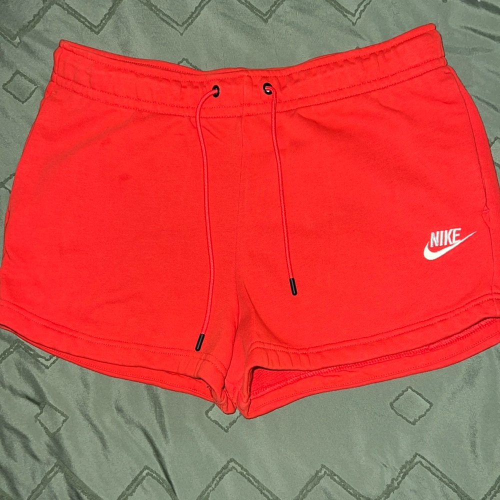 Red Nike shorts